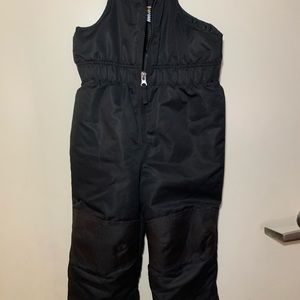 Black overalls snow suit for toddler.